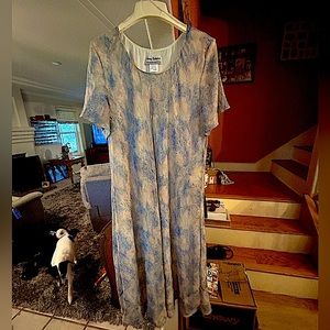 Beautiful dress. Only worn once for a wedding. Been stored in my closet.